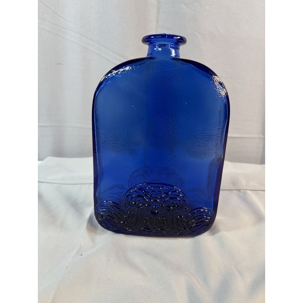 Vintage Art Deco Cobalt Blue Bottle w/ raised Floral pattern  8.25” Tall